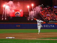 Francisco Alvarez of the New York Mets rounds the bases on Francisco Lindor's grand slam home run during the sixth inning in Game 4 of the N...