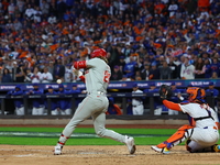 Alec Bohm #28 of the Philadelphia Phillies drives in a run on a fielder's choice during the fourth inning in Game 4 of the baseball NL Divis...