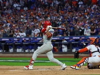 Alec Bohm #28 of the Philadelphia Phillies drives in a run on a fielder's choice during the fourth inning in Game 4 of the baseball NL Divis...