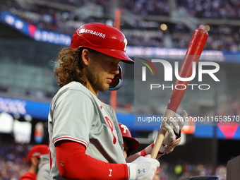 Philadelphia Phillies player Alec Bohm #28 stands in the hole during the fourth inning in Game 4 of the baseball NL Division Series against...