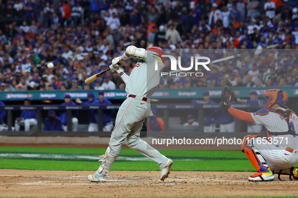 Nick Castellanos #8 of the Philadelphia Phillies doubles during the fourth inning in Game 4 of the baseball NL Division Series against the N...