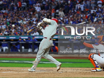 Nick Castellanos #8 of the Philadelphia Phillies doubles during the fourth inning in Game 4 of the baseball NL Division Series against the N...