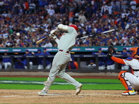 Nick Castellanos #8 of the Philadelphia Phillies doubles during the fourth inning in Game 4 of the baseball NL Division Series against the N...