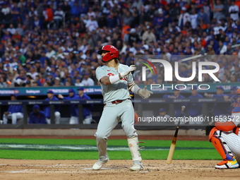 Nick Castellanos #8 of the Philadelphia Phillies doubles during the fourth inning in Game 4 of the baseball NL Division Series against the N...