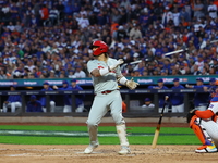 Nick Castellanos #8 of the Philadelphia Phillies doubles during the fourth inning in Game 4 of the baseball NL Division Series against the N...