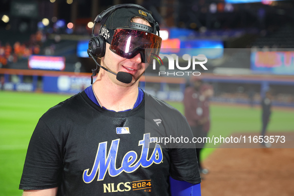 Pete Alonso #20 of the New York Mets celebrates with a teammate after winning the NL Division Series against the Philadelphia Phillies at Ci...