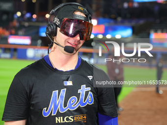 Pete Alonso #20 of the New York Mets celebrates with a teammate after winning the NL Division Series against the Philadelphia Phillies at Ci...