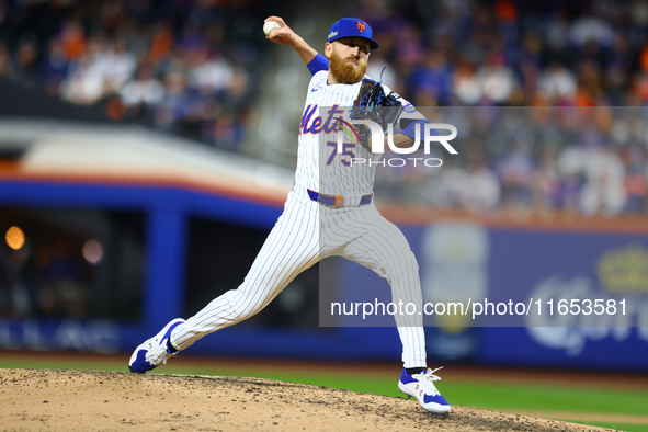 New York Mets relief pitcher Reed Garrett #75 throws during the sixth inning in Game 4 of a baseball NL Division Series against the Philadel...