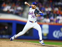 New York Mets relief pitcher Reed Garrett #75 throws during the sixth inning in Game 4 of a baseball NL Division Series against the Philadel...