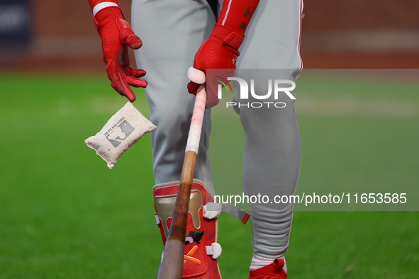 Philadelphia Phillies' Bryce Harper #3 prepares his bat while on deck during the fourth inning in Game 4 of the baseball NL Division Series...