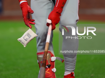 Philadelphia Phillies' Bryce Harper #3 prepares his bat while on deck during the fourth inning in Game 4 of the baseball NL Division Series...