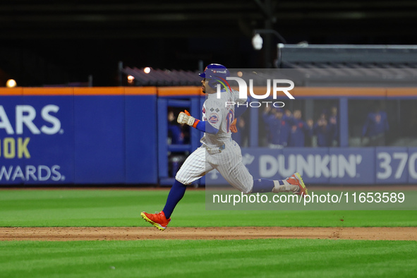 Francisco Lindor #12 of the New York Mets doubles during the fifth inning in Game 4 of the baseball NL Division Series against the Philadelp...