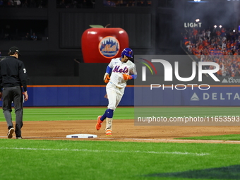 New York Mets player Francisco Lindor #12 rounds the bases after hitting a home run during the sixth inning in Game 4 of the baseball NL Div...