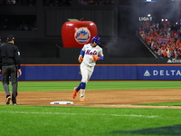 New York Mets player Francisco Lindor #12 rounds the bases after hitting a home run during the sixth inning in Game 4 of the baseball NL Div...