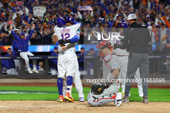 New York Mets player Francisco Lindor #12 rounds the bases after hitting a home run during the sixth inning in Game 4 of the baseball NL Div...