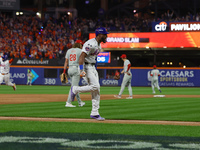 New York Mets' Starling Marte #6 rounds the bases on Francisco Lindor's grand slam home run during the sixth inning in Game 4 of the NLDS ag...