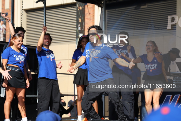 Fans participate in the Mets Block Party before the start of Game 4 of a baseball NL Division Series against the New York Mets at Citi Field...