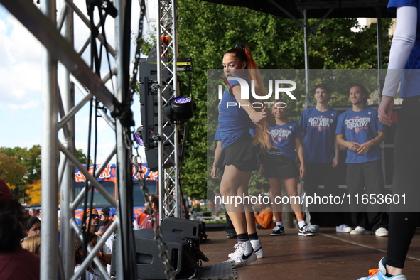 Fans participate in the Mets Block Party before the start of Game 4 of a baseball NL Division Series against the New York Mets at Citi Field...