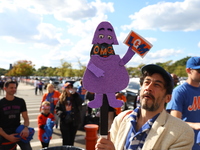 Fans participate in the Mets Block Party before the start of Game 4 of a baseball NL Division Series against the New York Mets at Citi Field...