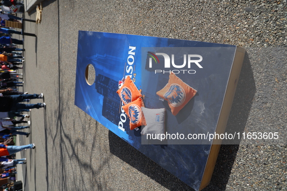 Fans participate in the Mets Block Party before the start of Game 4 of a baseball NL Division Series against the New York Mets at Citi Field...