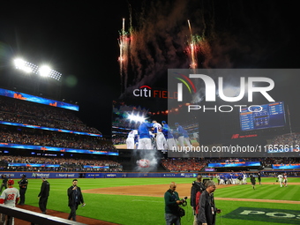 The New York Mets celebrate after their 4-1 win against the Philadelphia Phillies at Citi Field in Flushing, N.Y., on October 9, 2024. The M...