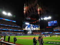 The New York Mets celebrate after their 4-1 win against the Philadelphia Phillies at Citi Field in Flushing, N.Y., on October 9, 2024. The M...