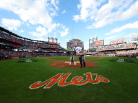 The national anthem is performed before game four of the NLDS between the Philadelphia Phillies and New York Mets at Citi Field in Flushing,...