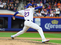 New York Mets starting pitcher David Peterson #23 throws during the eighth inning in Game 4 of the baseball NL Division Series against the P...