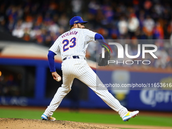 New York Mets starting pitcher David Peterson #23 throws during the seventh inning in Game 4 of a baseball NL Division Series against the Ph...