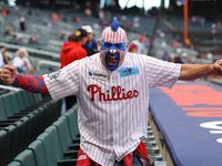 A Philadelphia Phillies fan appears pumped up for Game 4 of a baseball NL Division Series against the New York Mets at Citi Field in Flushin...