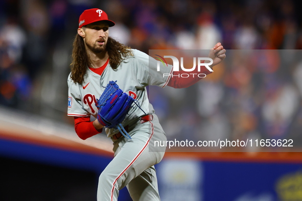 Philadelphia Phillies relief pitcher Matt Strahm #25 throws during the eighth inning in Game 4 of a baseball NL Division Series against the...