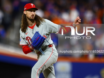 Philadelphia Phillies relief pitcher Matt Strahm #25 throws during the eighth inning in Game 4 of a baseball NL Division Series against the...