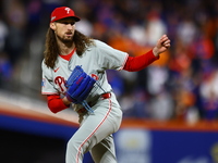 Philadelphia Phillies relief pitcher Matt Strahm #25 throws during the eighth inning in Game 4 of a baseball NL Division Series against the...