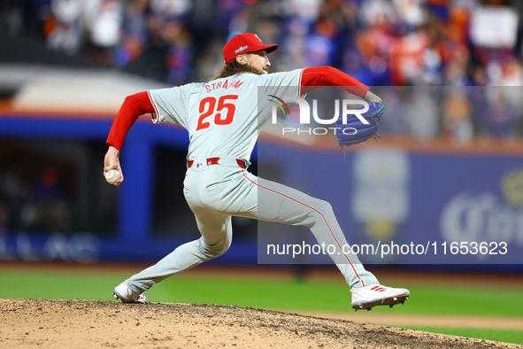 Philadelphia Phillies relief pitcher Matt Strahm #25 throws during the eighth inning in Game 4 of a baseball NL Division Series against the...