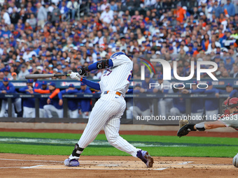 Mark Vientos #27 of the New York Mets doubles during the second inning in Game 4 of a baseball NL Division Series against the Philadelphia P...