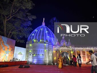 A community puja pandal is themed on the Maa Kamakhya Temple during the Durga Puja festival in Guwahati, India, on October 9, 2024. (