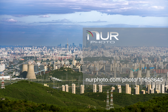 An aerial photo shows the Beijing city skyline in Beijing, China, on September 21, 2024. 