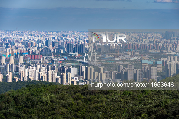 An aerial photo shows the Beijing city skyline in Beijing, China, on September 21, 2024. 