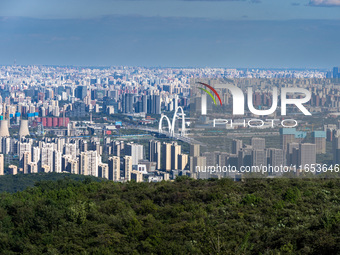 An aerial photo shows the Beijing city skyline in Beijing, China, on September 21, 2024. (