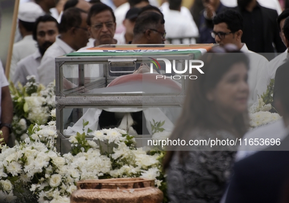 People gather to pay tribute to the mortal remains of Indian industrialist Ratan Tata at the National Centre for the Performing Arts (NCPA)...