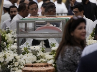 People gather to pay tribute to the mortal remains of Indian industrialist Ratan Tata at the National Centre for the Performing Arts (NCPA)...