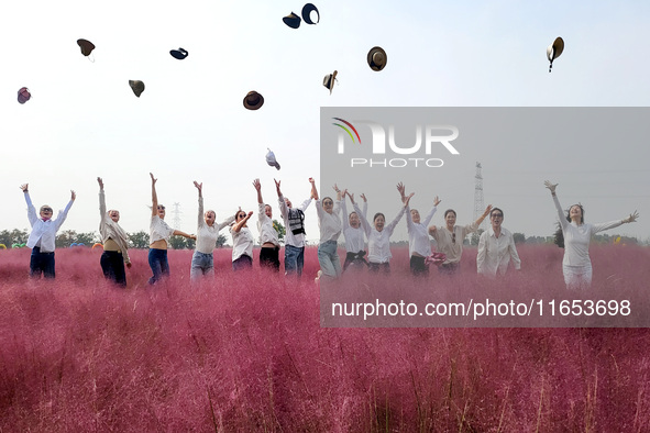 Retired soldiers and teachers visit a scenic spot to celebrate the upcoming Double Ninth Festival in Lianyungang, Jiangsu province, China, o...