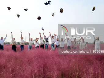 Retired soldiers and teachers visit a scenic spot to celebrate the upcoming Double Ninth Festival in Lianyungang, Jiangsu province, China, o...