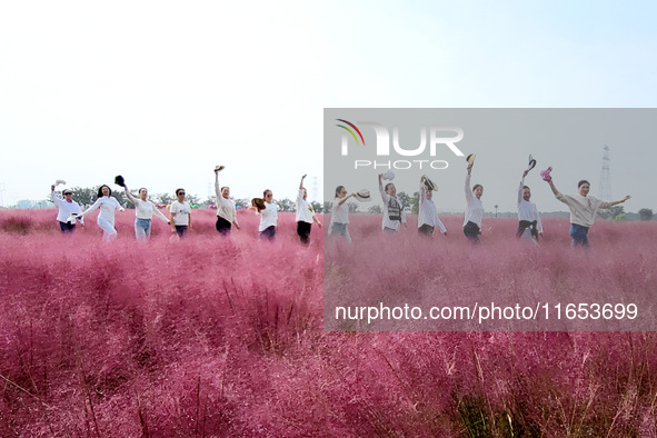 Retired soldiers and teachers visit a scenic spot to celebrate the upcoming Double Ninth Festival in Lianyungang, Jiangsu province, China, o...