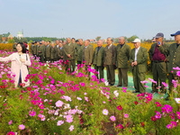 Retired soldiers and teachers visit a scenic spot to celebrate the upcoming Double Ninth Festival in Lianyungang, Jiangsu province, China, o...