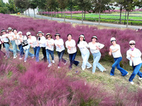 Retired soldiers and teachers visit a scenic spot to celebrate the upcoming Double Ninth Festival in Lianyungang, Jiangsu province, China, o...