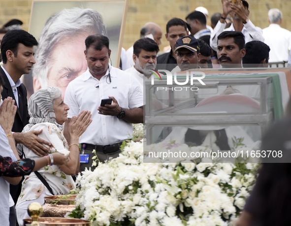 People gather to pay tribute to the mortal remains of Indian industrialist Ratan Tata at the National Centre for the Performing Arts (NCPA)...