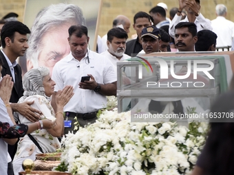 People gather to pay tribute to the mortal remains of Indian industrialist Ratan Tata at the National Centre for the Performing Arts (NCPA)...