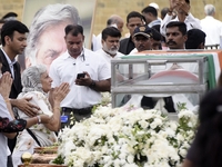 People gather to pay tribute to the mortal remains of Indian industrialist Ratan Tata at the National Centre for the Performing Arts (NCPA)...