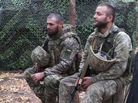 Soldiers of a 2S1 Gvozdika self-propelled howitzer crew of Ukraine's 154th Separate Mechanized Brigade are at positions in Kharkiv region, n...